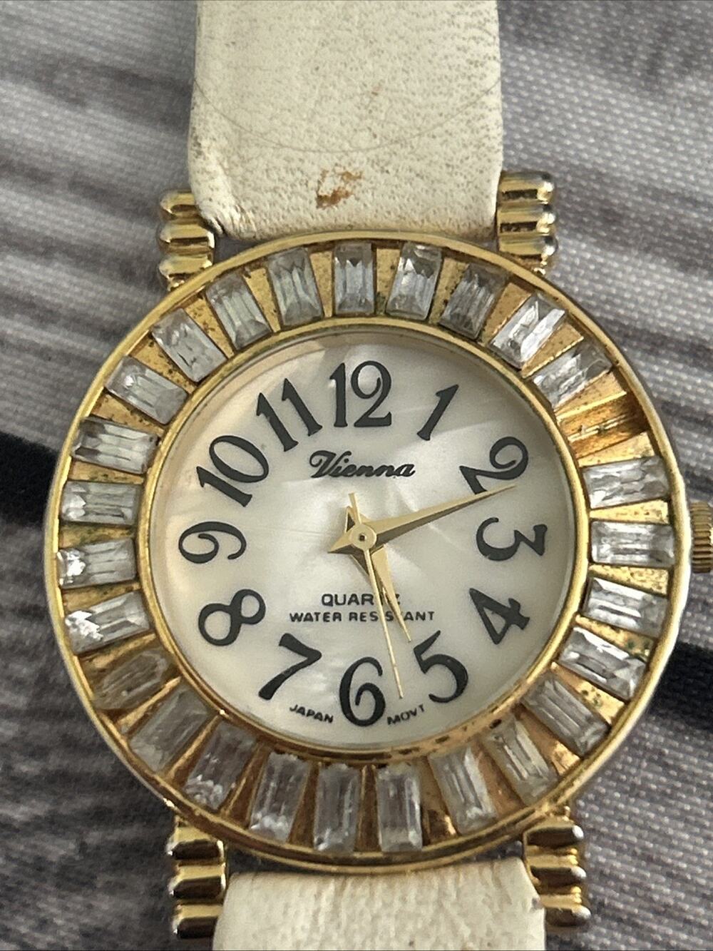Vienna Gold Tone White Band Women’s Quartz Watch